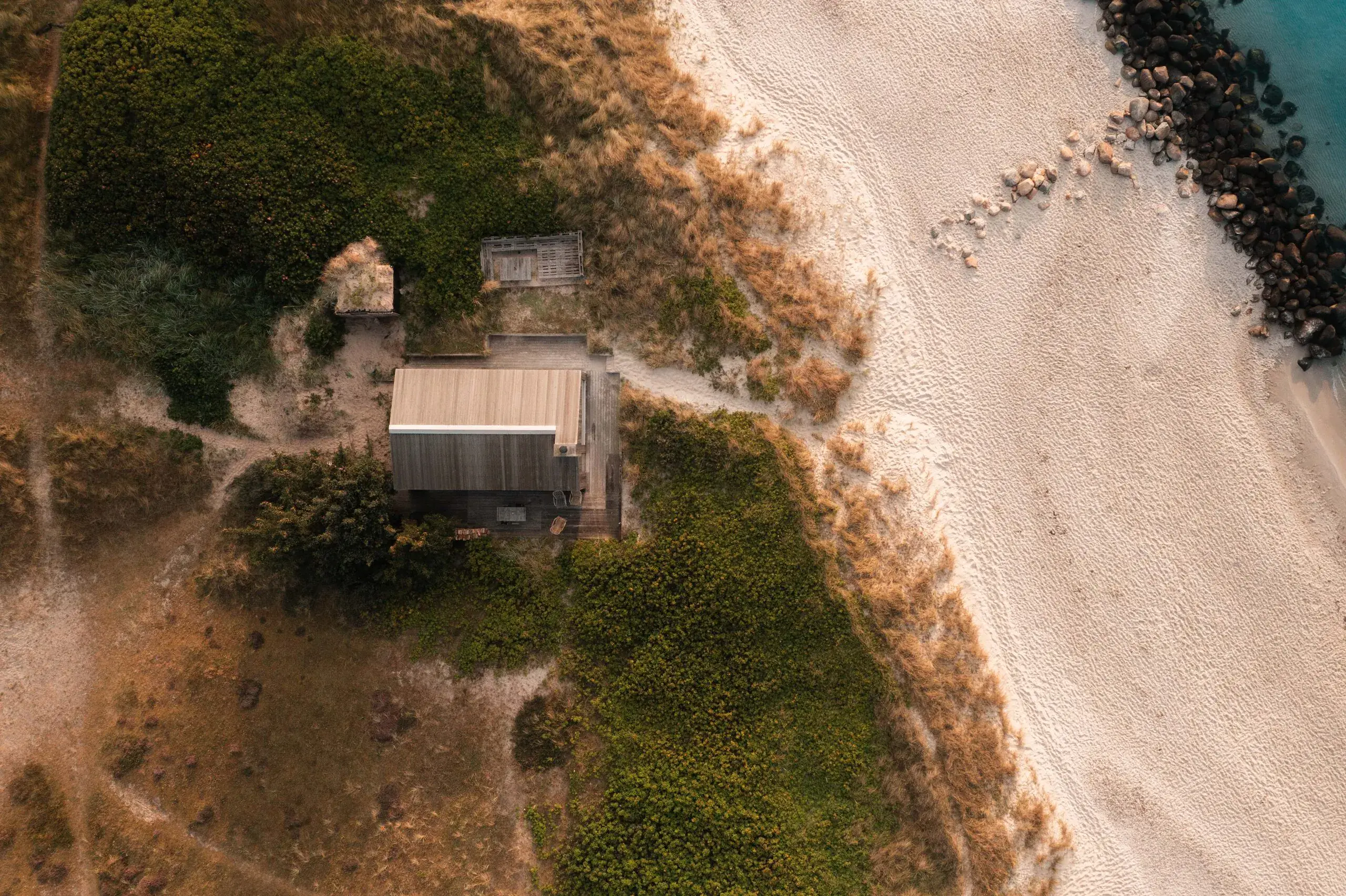 Aerial drone photography by Interfilm Productions — coastal cabin
