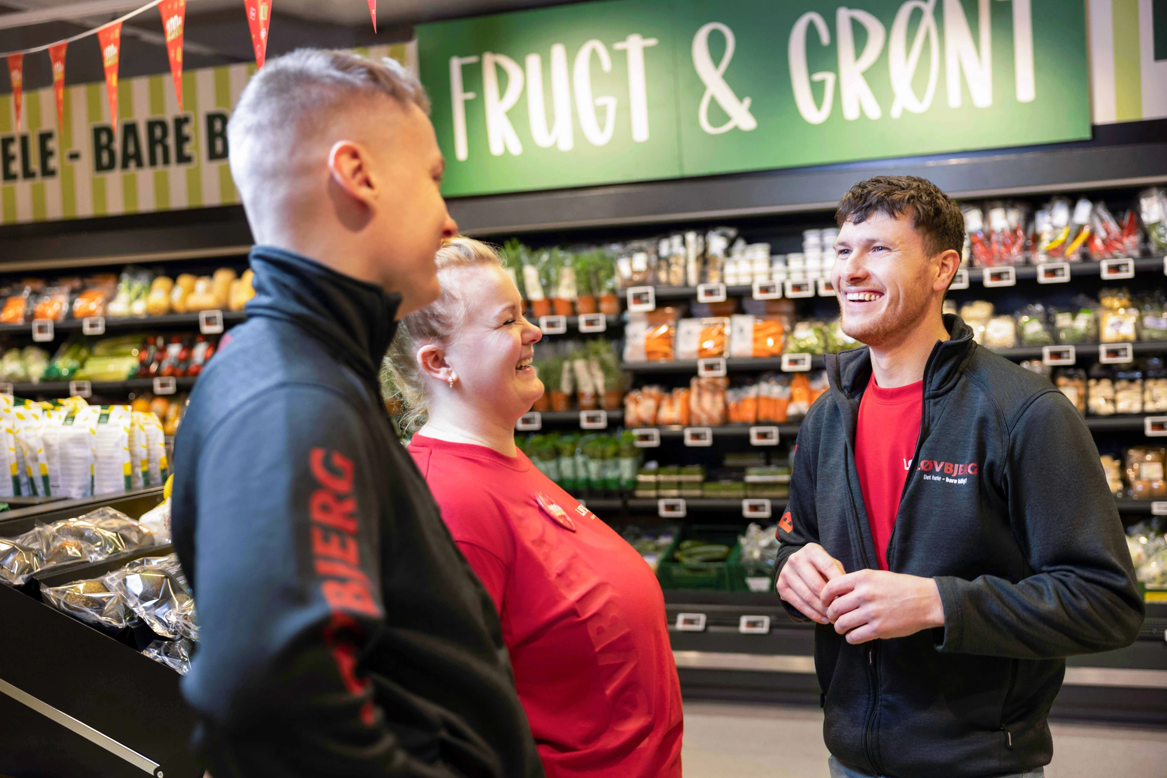 Corporate photography by Interfilm Productions — Løvbjerg staff in fresh produce aisle