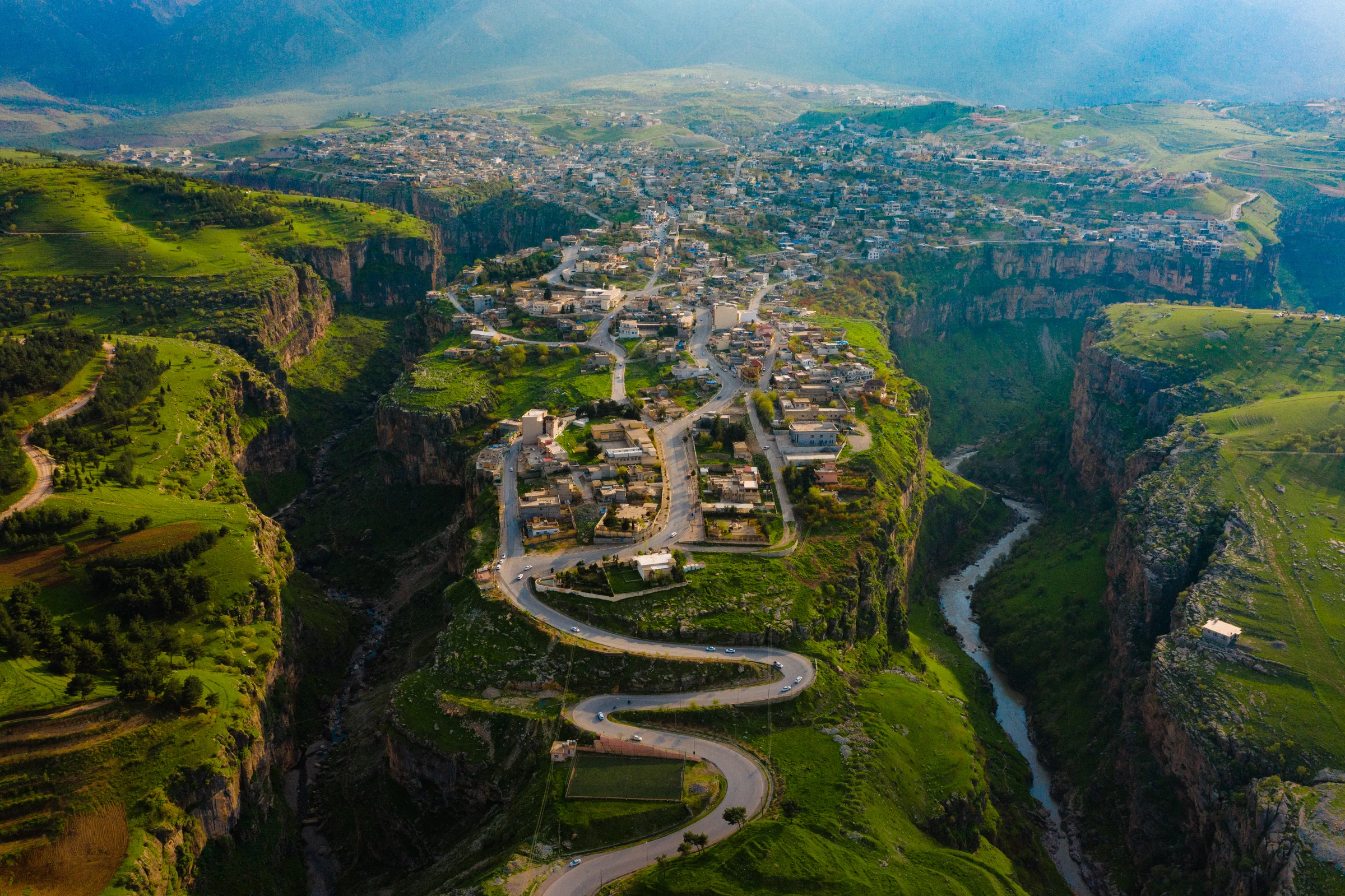 Aerial drone photography by Interfilm Productions — canyon village in Kurdistan